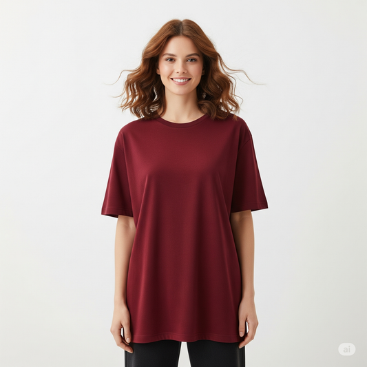 Woman wearing a burgundy t-shirt on a white background
